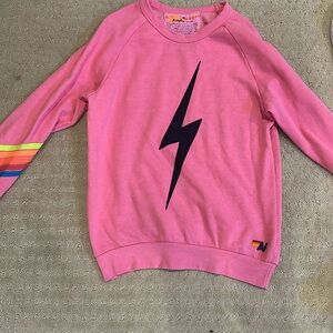 Aviator Nation Pink Lightning Bolt Sweatshirt with Rainbow Sleeve Stripes